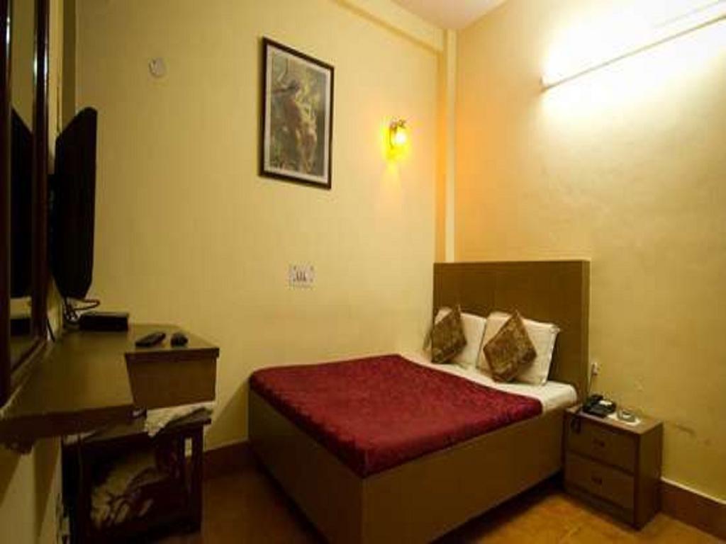 Hotel Woodland Deluxe Neu-Delhi Zimmer foto