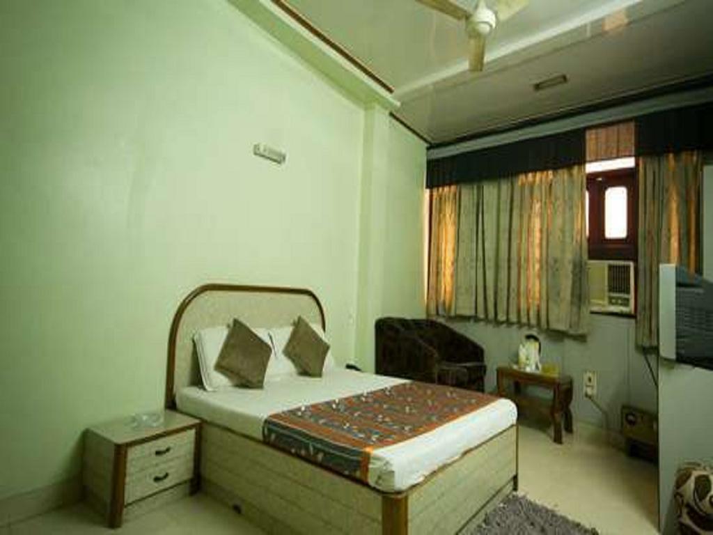 Hotel Woodland Deluxe Neu-Delhi Zimmer foto